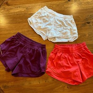 3 pairs of Lululemon hotty hot low rise lined shorts
